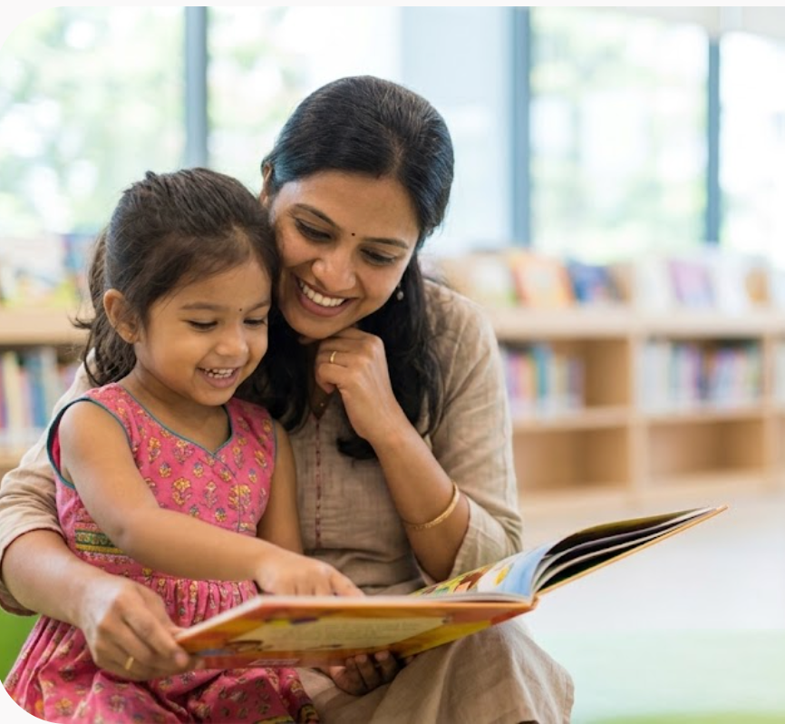A parent and child looking at the Everyday Routine Toolkit together at home